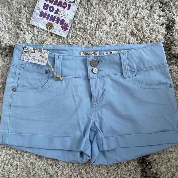 Light blue shorts . - Picture 2 of 5